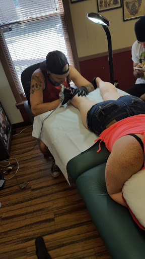 Tattoo Shop «Skinny Buddha Tattoo», reviews and photos, 203 S Monroe Ave, Green Bay, WI 54301, USA