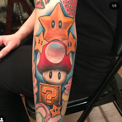 Explore back of neck tattoo cover up ideas, creative tattoo ideas in Girard, available at Empress Tattoos FKA Treehouse Tattoo