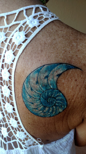 Explore mufc tattoo ideas, creative tattoo ideas in Kailua Kona, available at Lady Luck Tattoo & Body Piercing