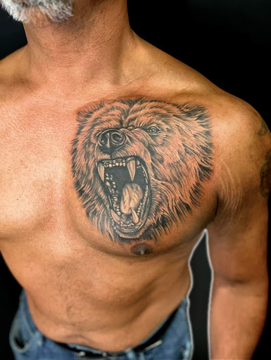 Explore blackout hand tattoo ideas, creative tattoo ideas in Warner Robins, available at Untold Pain Tattoo Studio