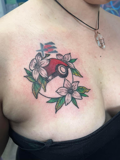 Explore flag tattoo ideas, creative tattoo ideas in Lake City, available at Crooked Spines Tattoo Studio