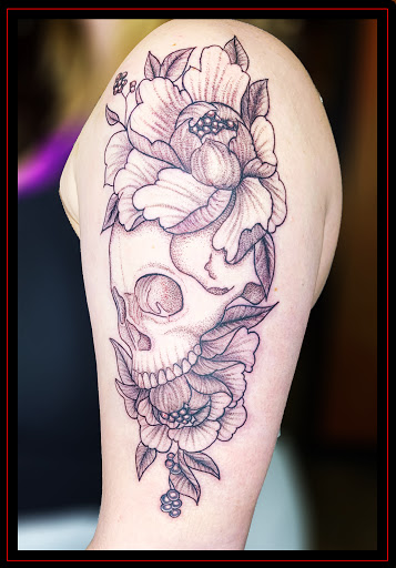 Find good vs evil tattoo ideas for your next unique tattoo in Omaha at Eternal Tattoo & Body Piercing - Omaha