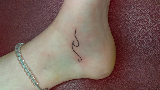 Explore iris tattoo ideas, creative tattoo ideas in Dallas, available at Fly Ink, Inc.