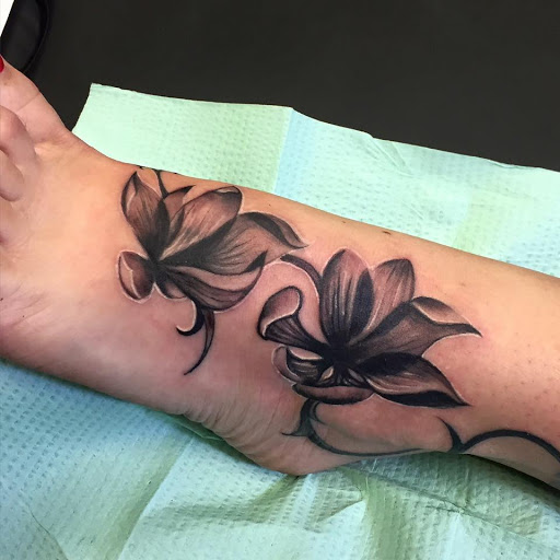 Explore neptune tattoo ideas, creative tattoo ideas in Clinton, available at Ritual Custom Tattoos