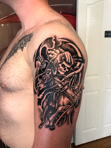 Find low back tattoo ideas for your next unique tattoo in Portland at Art Immortal Tattoo and Piercing