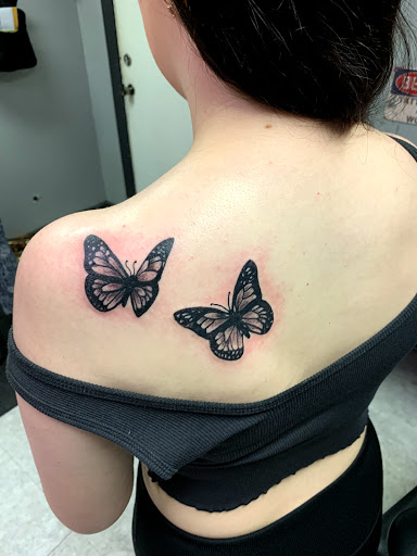 Explore name placement tattoo ideas, creative tattoo ideas in Hudson Falls, available at ALTERED ADDICTION TATTOOS