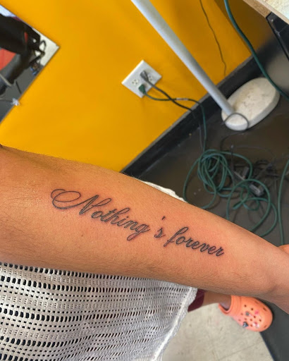 Explore flower half sleeve tattoo ideas, creative tattoo ideas in Lewes, available at Ancient Art Tattoo & Piercing Studio