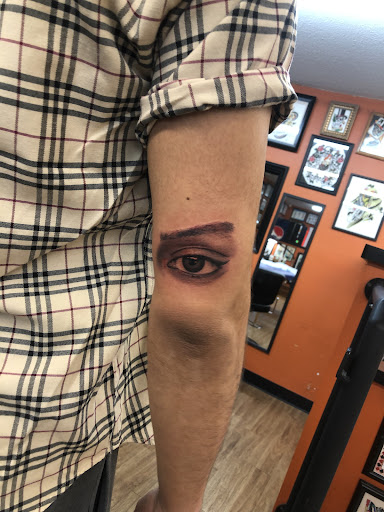 Explore forearm flower tattoo ideas, creative tattoo ideas in Orlando, available at Cast Iron Tattoos