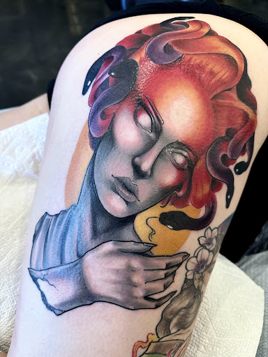 Explore black and white tattoo ideas for men, creative tattoo ideas in Orange Park, available at Revelation Tattoo company