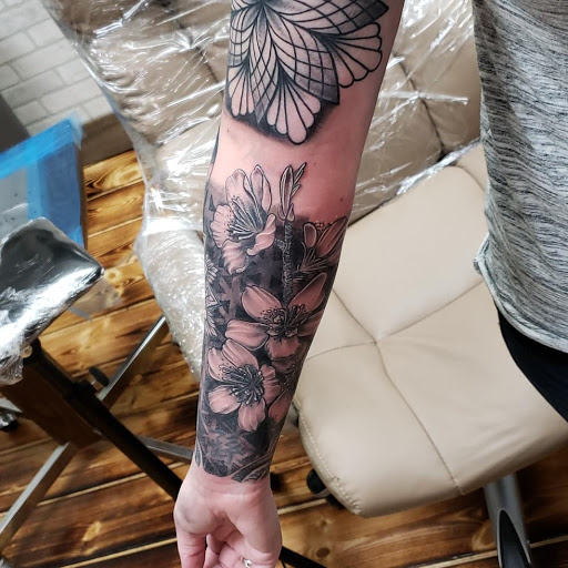 Explore female chest piece tattoo ideas, creative tattoo ideas in Sioux City, available at Thorn-Side Tattoo & Piercing