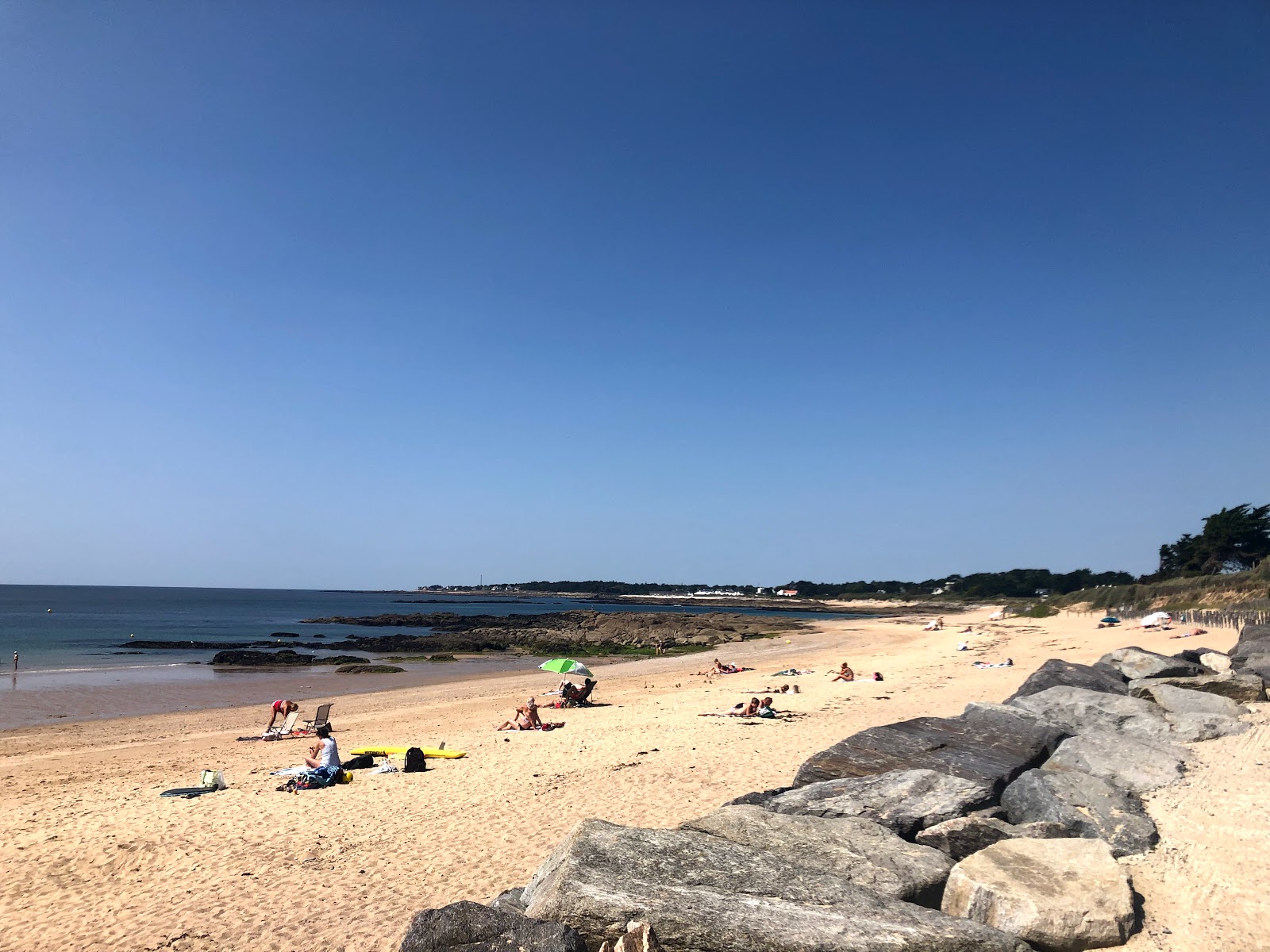 Foto di Plage de Ker Elisabeth con una superficie del sabbia beige