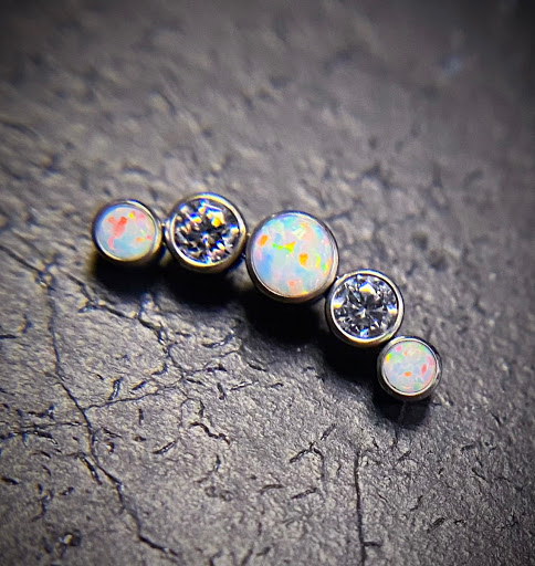 Explore tattoo shoulder ideas, creative tattoo ideas in Springfield, available at Body Piercing By Qui Qui