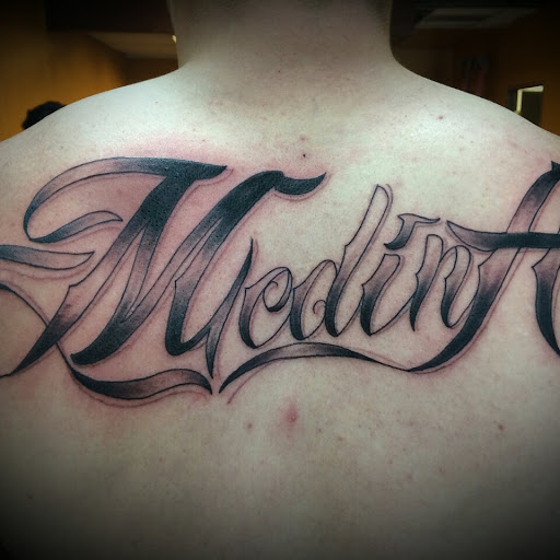 Explore old english tattoo ideas, creative tattoo ideas in Colorado Springs, available at Empire Tattoo Co.