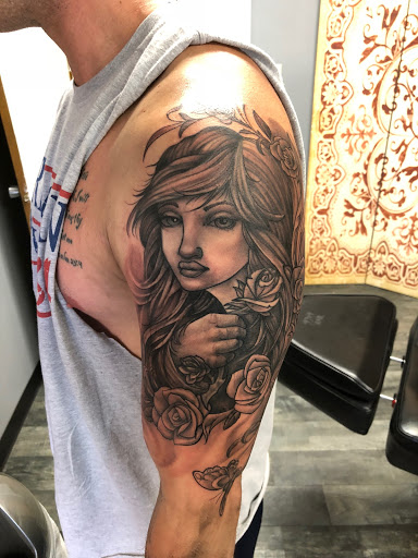 Explore family names tattoo ideas for guys, creative tattoo ideas in Des Moines, available at Skin Kitchen Tattoo