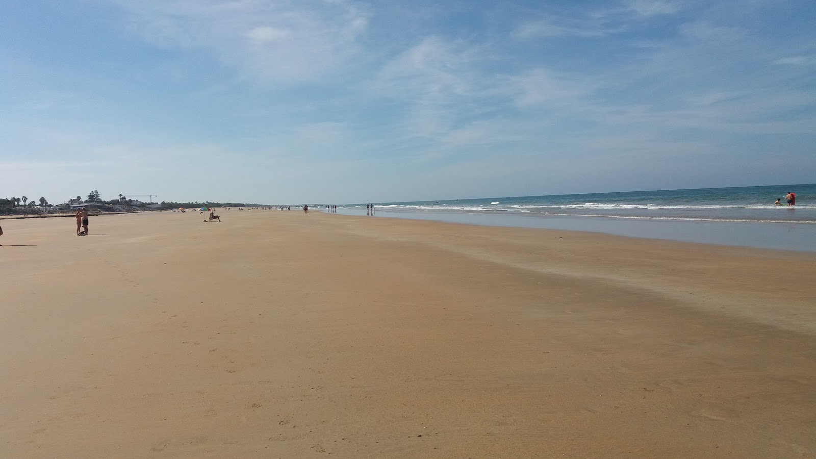 Fotografija Playa de las Tres Piedras z svetel pesek površino