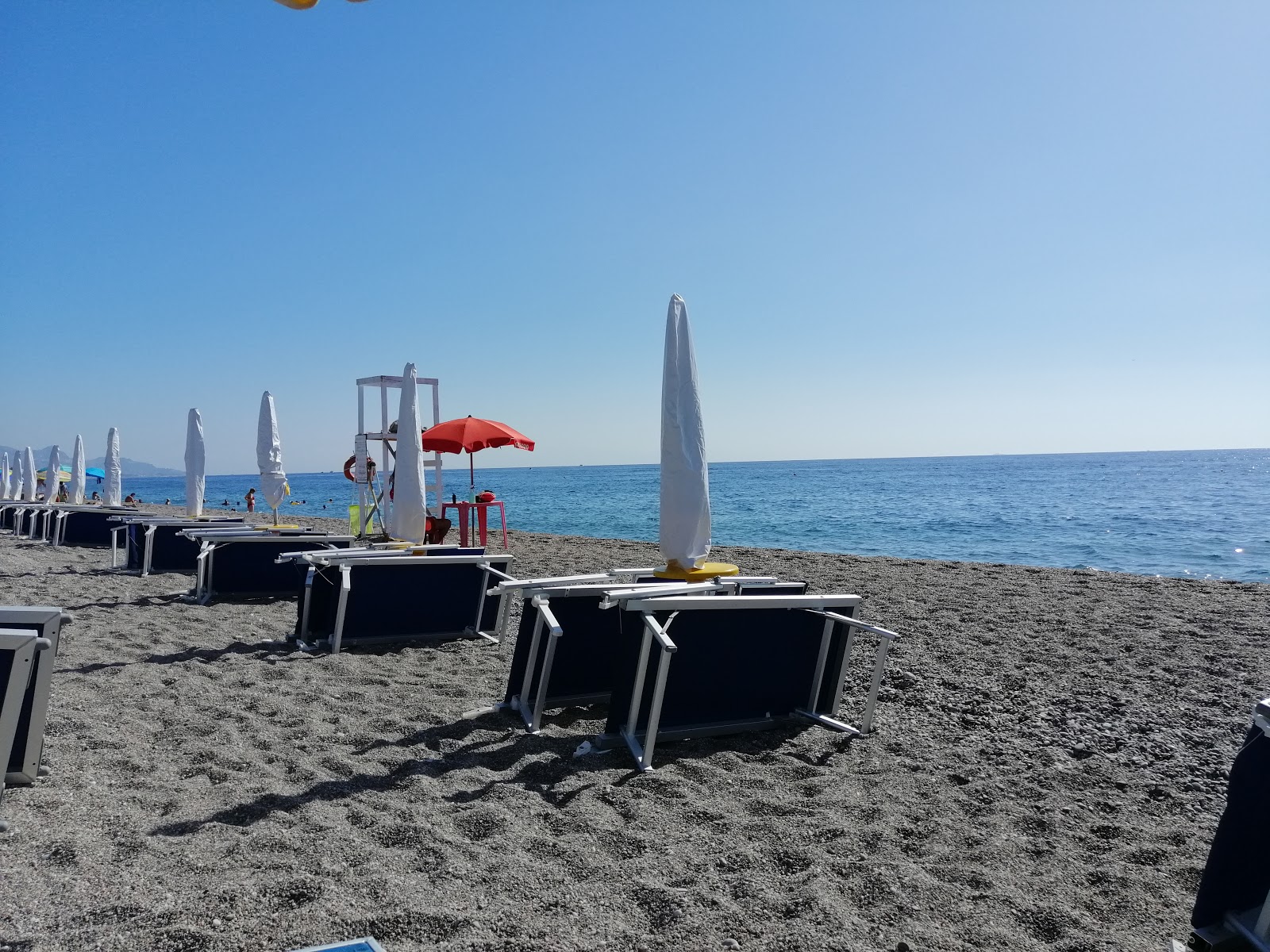 Fotografie cu Spiaggia di Sant'Anna și așezarea