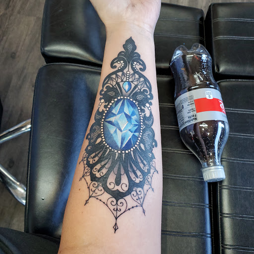 Explore mens collar bone tattoo ideas, creative tattoo ideas in West Bend, available at Moon Tattoos