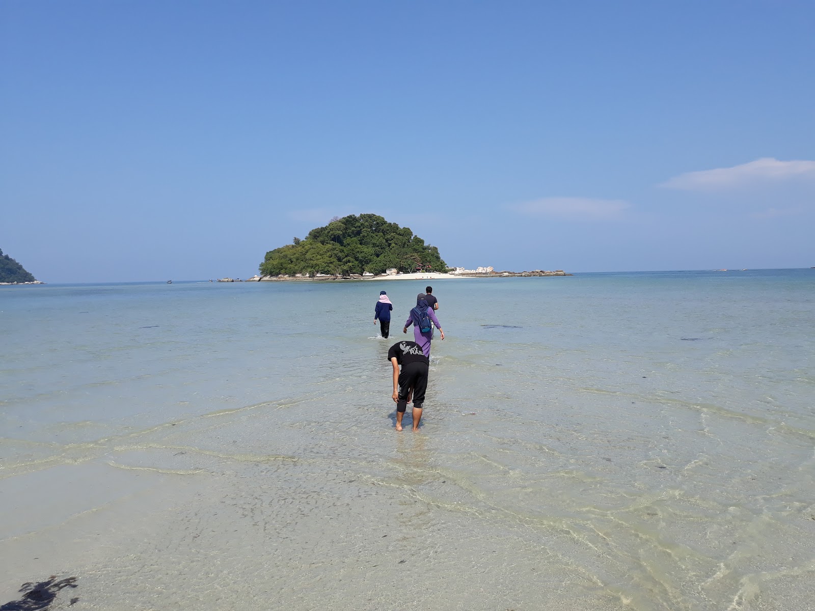 Photo of Teluk Nipah Coral Beach and the settlement