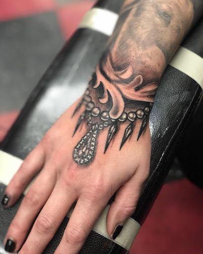 Explore dark humor tattoo ideas, creative tattoo ideas in Dayton, available at 33 Lions Tattoo