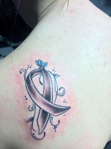 Explore female arm sleeve tattoo ideas, creative tattoo ideas in Nampa, available at Temptation Tattoo & Body Piercing