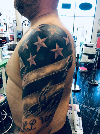 Find tattoo ideas music notes for your next unique tattoo in Redding at Caddy Daddys