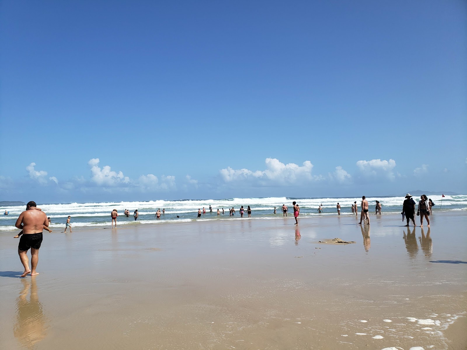 Photo of Guarda do Embaú Beach with long straight shore