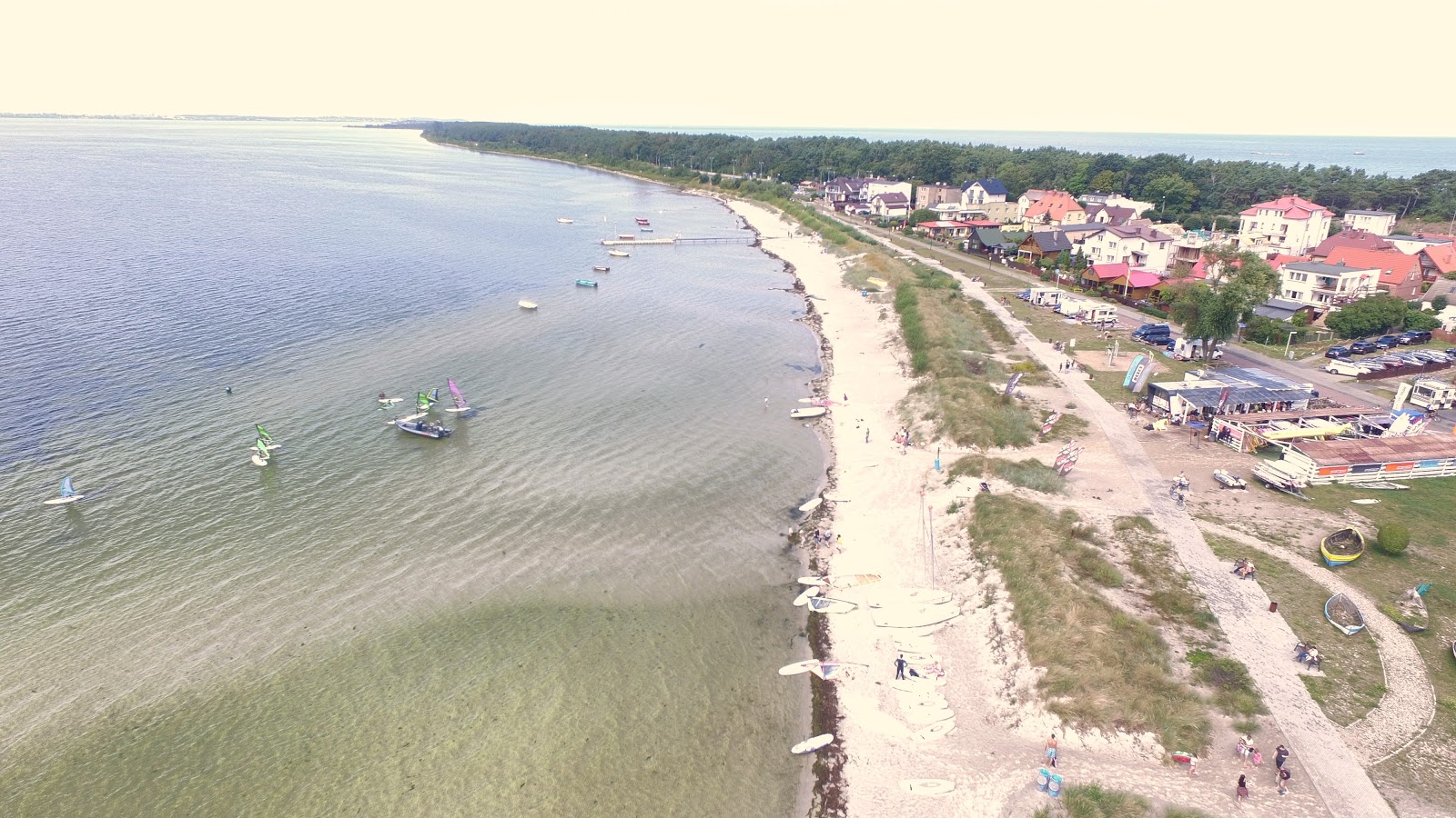 Foto van Kuznica Beach met turquoise puur water oppervlakte