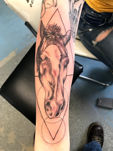 Find sword tattoo ideas for your next unique tattoo in Muncie at The Tattoo Studio