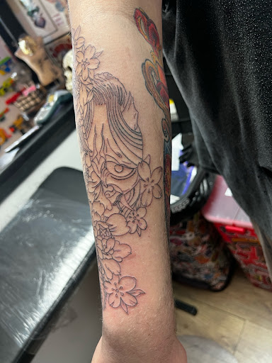 Explore mens spine tattoo ideas, creative tattoo ideas in Jefferson, available at Slammin Ink Tattoo