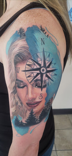 Explore wrist scar tattoo ideas, creative tattoo ideas in Baraboo, available at Gold Leaf Tattoo Collective and Art Gallery