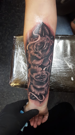Explore arm tattoo men ideas, creative tattoo ideas in Grants Pass, available at Irish Ink Tattoo Studio