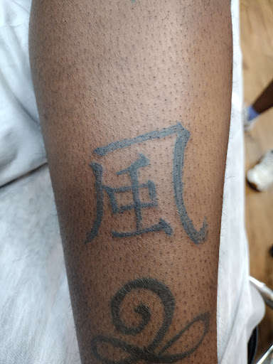 Explore men hand tattoo ideas, creative tattoo ideas in Park Hills, available at Sideshow Tattoo and Piercings