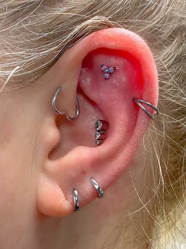 Explore half sleeve tattoo ideas for men, creative tattoo ideas in Springfield, available at Body Piercing By Qui Qui