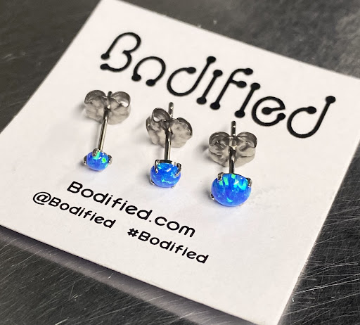 Explore meaningful elegant spine tattoo ideas, creative tattoo ideas in Oswego, available at Bodified