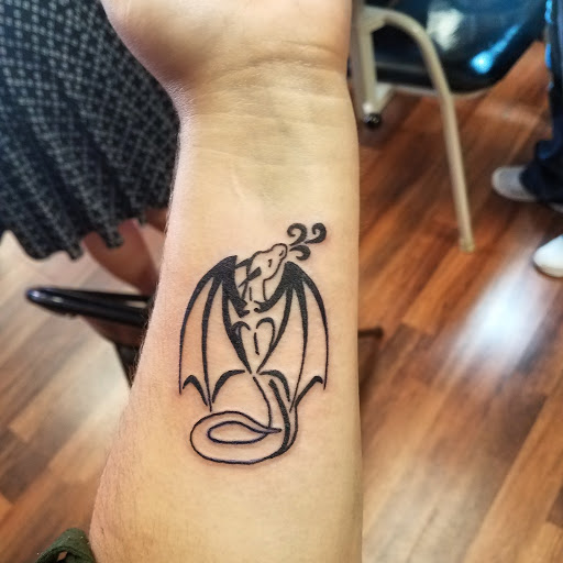 Explore tattoo ideas water, creative tattoo ideas in Hudson Falls, available at ALTERED ADDICTION TATTOOS