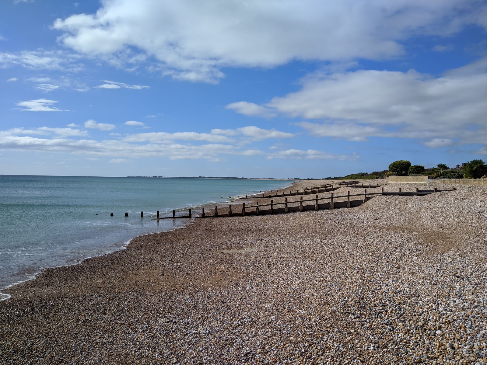 Foto van Aldwick strand met blauw puur water oppervlakte