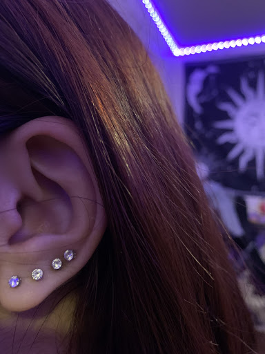 Explore black flower tattoo ideas, creative tattoo ideas in Denver, available at Viva La Raza Tattoo Club