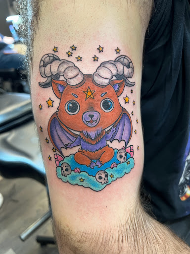 Explore dog paw tattoo ideas, creative tattoo ideas in Meadville, available at Lucky Lucys Tattoo and Art Studio