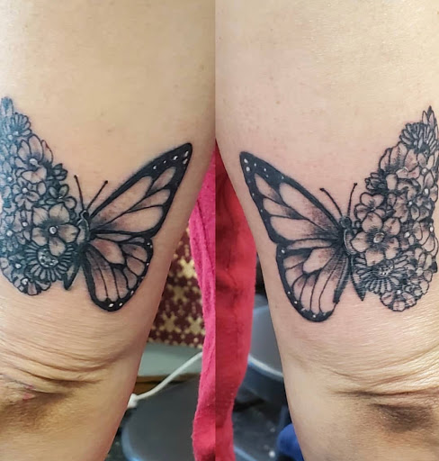 Explore men's back of neck tattoo ideas, creative tattoo ideas in Kenosha, available at Kenosha Tattoo Company