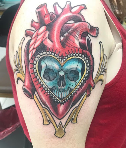 Explore side hand tattoo ideas, creative tattoo ideas in Avon, available at Avanti Tattoo