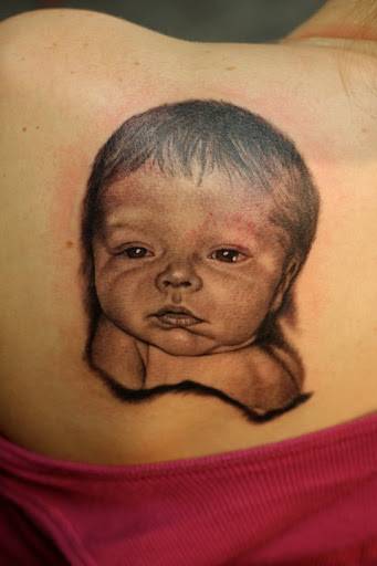 Explore little dragon tattoo ideas, creative tattoo ideas in Des Moines, available at Skin Kitchen Tattoo