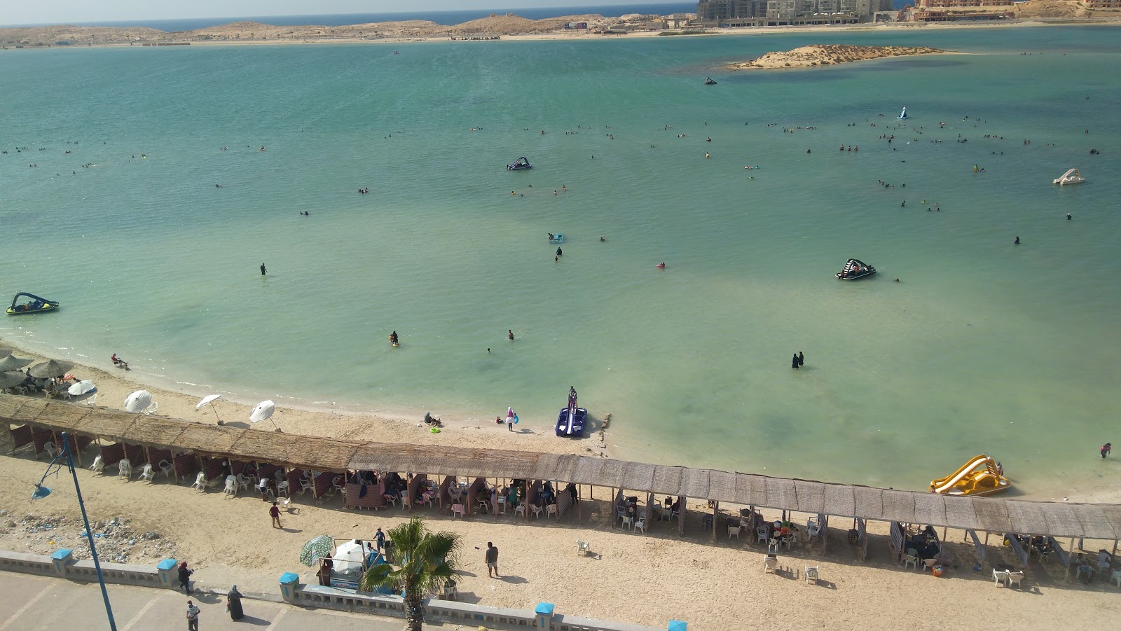 Foto de Rommel Lagoon Beach com areia brilhante superfície