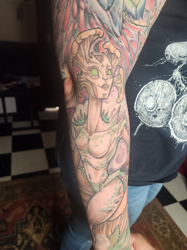 Explore bass clef tattoo ideas, creative tattoo ideas in Augusta, available at Mr. Tattoo