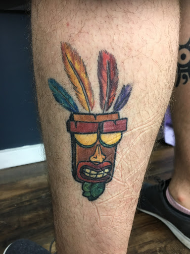 Explore patchwork tattoo ideas, creative tattoo ideas in Chapel Hill, available at Golden Falcon Tattoo and Piercing