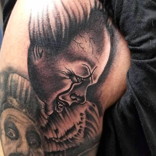 Explore black male tattoo ideas, creative tattoo ideas in Edinboro, available at No Regrets Tattoo (Appointment Only)
