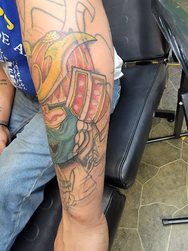 Tattoo Shop «Tha Flatlinerz Allstarz Tattoo & Piercings», reviews and photos, 235 N Clinton Ave, Rochester, NY 14605, USA