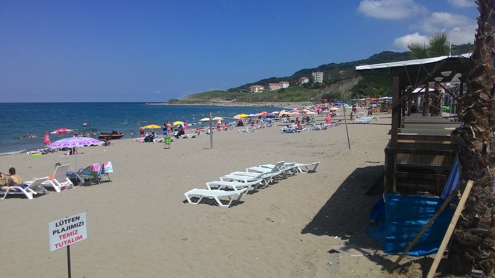 Foto di Guzelkent Halk Plaji e l'insediamento