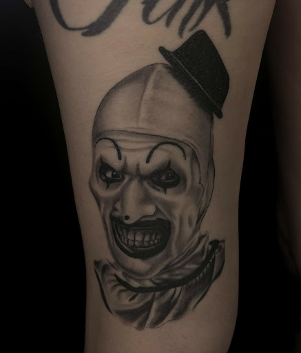 Explore loyalty tattoo ideas for men, creative tattoo ideas in Alamogordo, available at The Poison Frog Tattoo Studio