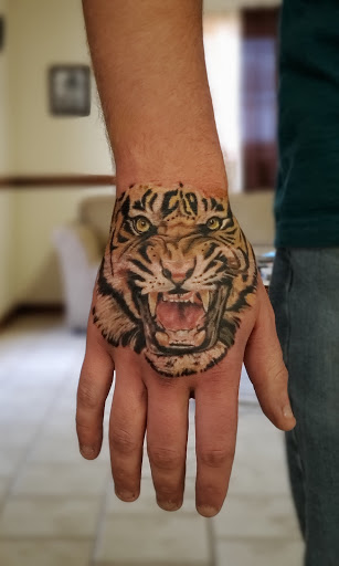 Explore neck tattoos ideas male, creative tattoo ideas in Stamford, available at KE Tattoo Studio