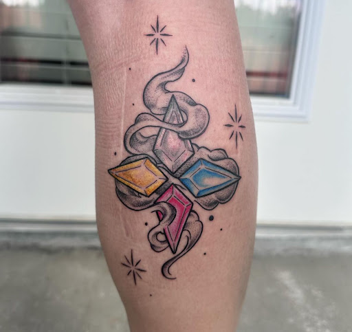 Explore design tattoo ideas for men, creative tattoo ideas in Marietta, available at The Queen Bee Tattoo and Piercing Parlour